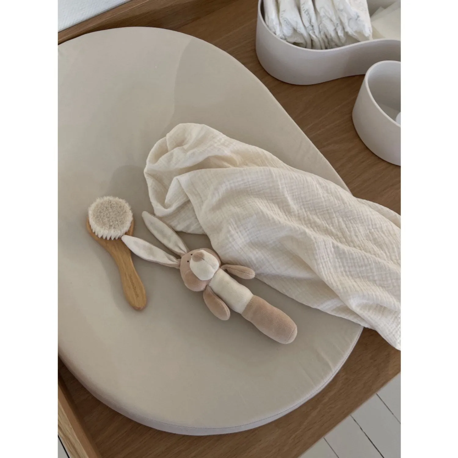 We Are Bitte Light Stone Oval Changing Pad